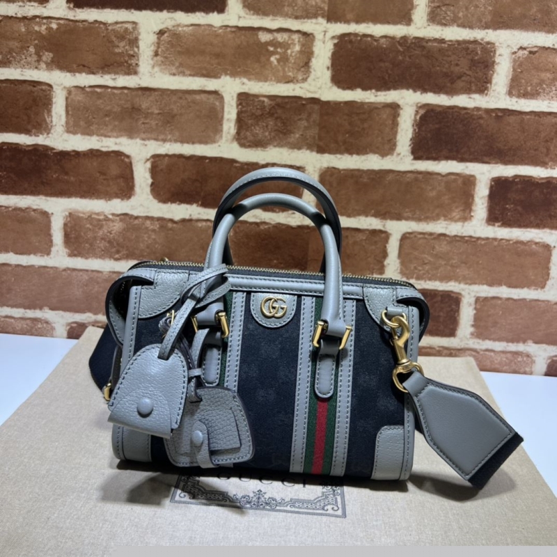 G*u*i top handle bags